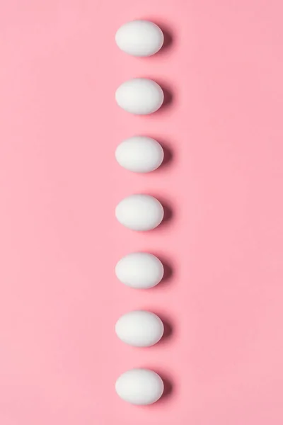 Row of white eggs — Stock Photo