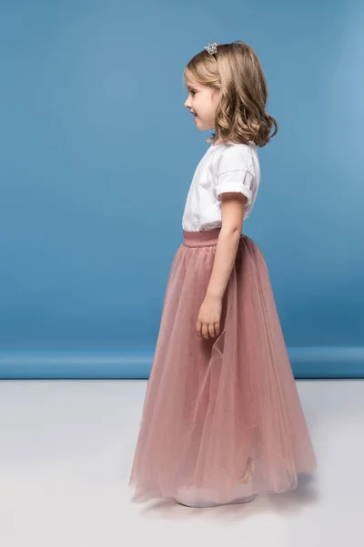 Little girl in pink skirt — Stock Photo