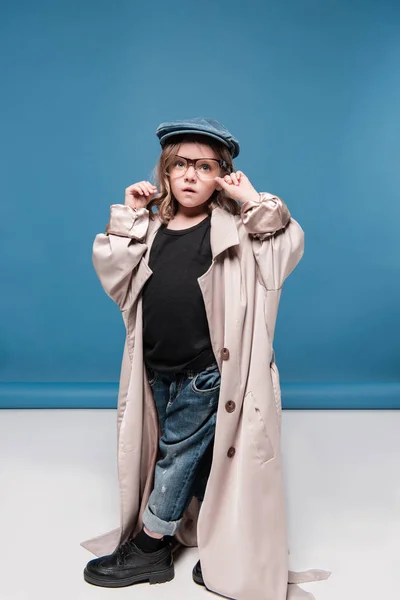 Pretty child girl in glasses and coat — Stock Photo