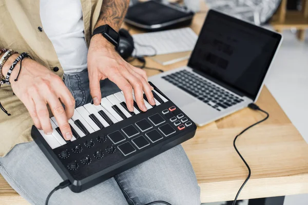 Modern dj working with MPC pad — Stock Photo