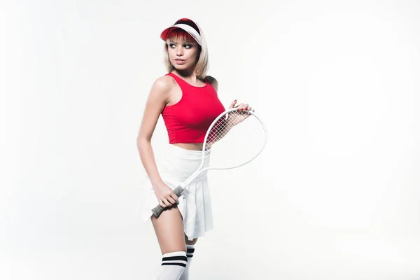 Стильна жінка з тенісною ракеткою — стокове фото