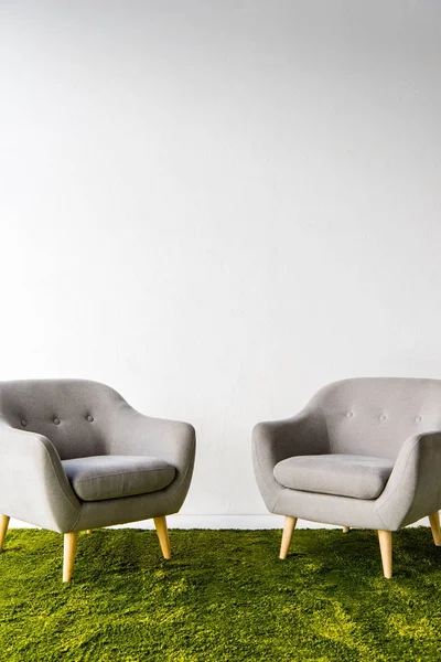 Two armchairs on carpet — Stock Photo