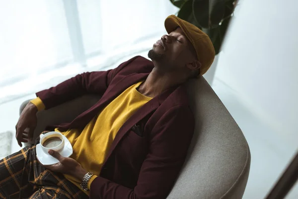 Man sleeping in armchair — Stock Photo