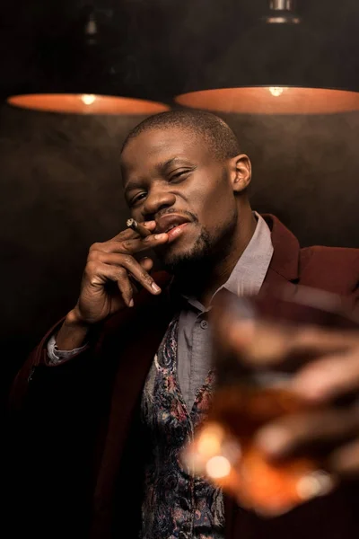 Smoking cigar — Stock Photo