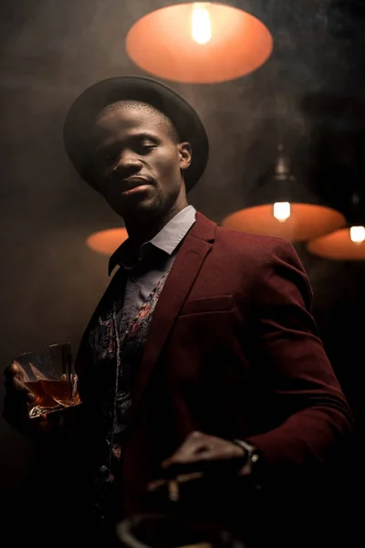 African american man in smoky room — Stock Photo