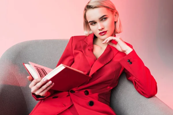 Attractive girl reading book — Stock Photo