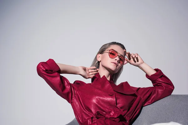 Attractive girl in red sunglasses — Stock Photo