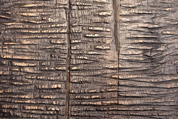 Close-up shot of cracked wooden material texture — Stock Photo