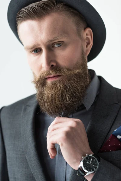 Man with vintage mustache and beard isolated on light background — Stock Photo