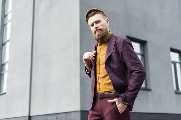 Man with vintage mustache and beard standing on street — Stock Photo