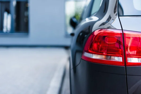 Red brake lights of car on street — Stock Photo