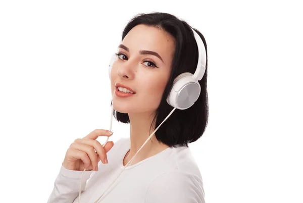 Joven hermosa mujer en los auriculares — Foto de Stock