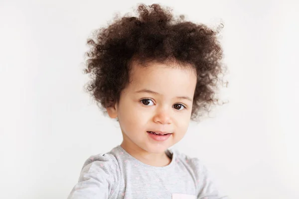 Cute funny little girl with curly hair — 스톡 사진