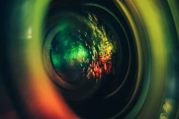 Beautiful abstract camera lens background multi colored glass reflection. Macro photography view.