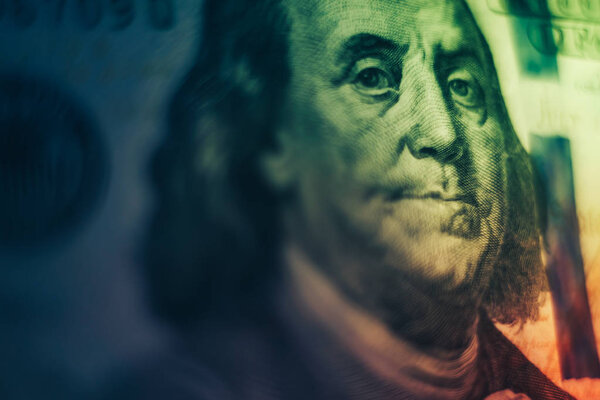 Close up Franklin's face on a one hundred dollar. American, US Dollars Cash Money background.
