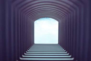 Güzel, soyut gri bir tünel. Arka planda beyaz bir ışık var..