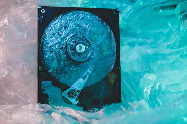 Close up beautiful open detail frozen hard disk on a table background. Concept protection information or save usser data.