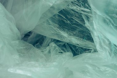 Güzel soyut plastik torba arka planında renk ışığı var. Plastik Torba Konsepti yok, dünyayı kurtar, dünyayı koru.