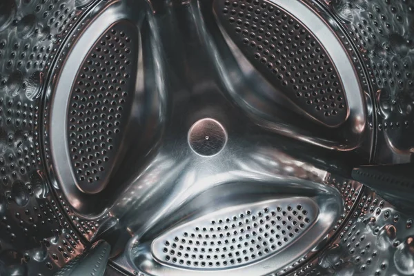 Close up beautiful Metal drum washing machine  background. Wide angle photo