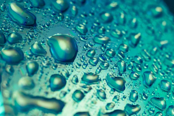 Närbild Vackra Färgade Vattendroppar Skiva Bakgrund — Stockfoto