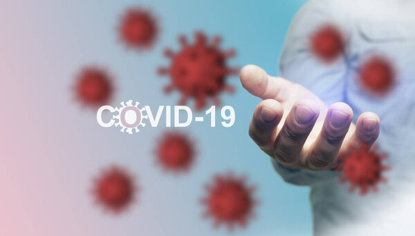 Ковид-19 вспышка или новый коронавирус, 2019-nCoV, вирус на красивом абстрактном фоне и опасный коронавирус открытой ладони жест мужской руки. Вирус Covid 19-NCP: контагион и распространение болезни. Пандемия и вирусная эпидемия
