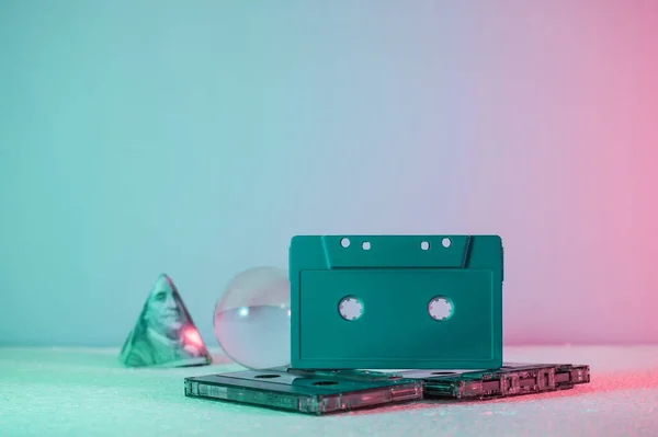 Beautiful Audio Cassette Tape Glass Ball Dollars Neon Light Minimalism — Stock Photo, Image