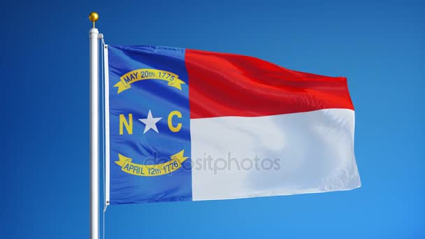North Carolina (stanu USA) flaga w zwolnionym tempie bezproblemowo zapętlone z alfa — Wideo stockowe