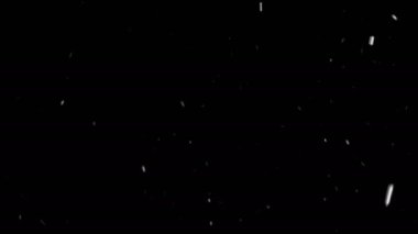 Çok sakin kar soldan sağa doğru düşüyor, sorunsuz bir şekilde ilmekledi