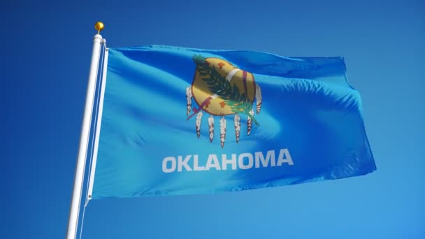 Oklahoma (USA stát) příznak v pomalém pohybu plynule smyčkou s alfa kanálem — Stock video