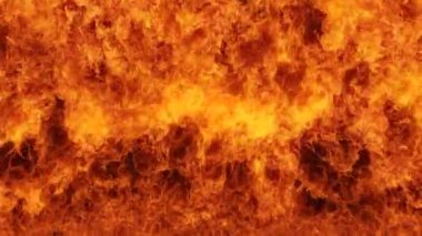 Kesintisiz döngü izole ile yavaş çekimde Cehennem ateş duvarı, cehennem ateşi yanıyor, yüksek hızlı kamera ile çekim, yoğun yakıt yanan, dijital kompozisyon için mükemmel. 