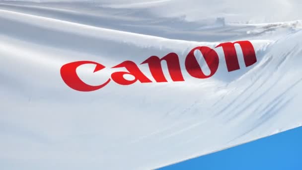 Bandera de la compañía Canon en cámara lenta, animación editorial — Vídeo de stock