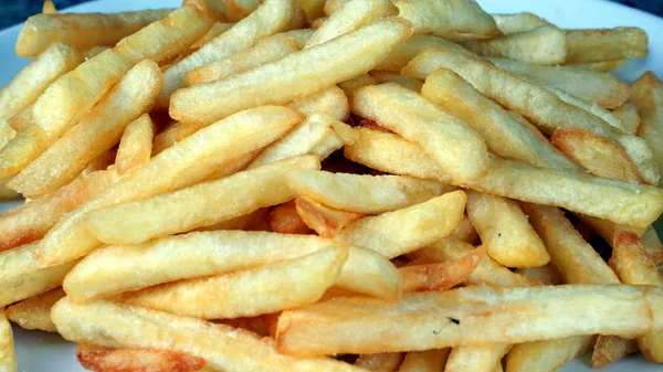 Batatas fritas, batatas fritas ou pedaços de dedo — Fotografia de Stock