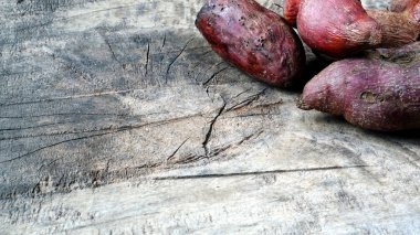 Sweet potato on the wood clipart