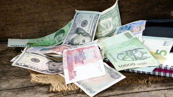 US dollars, Korean Won, Euro bills and some money bills and banknotes — Stock Photo, Image