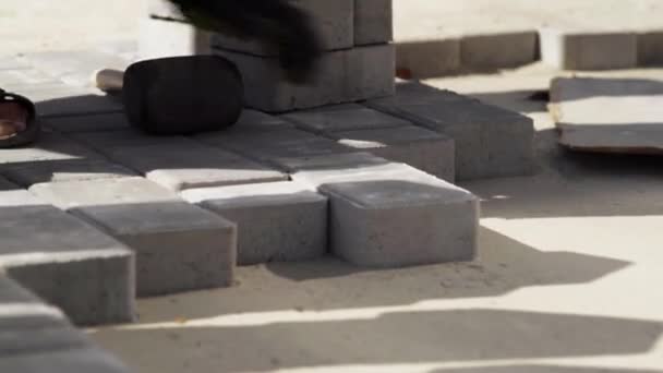 Close-Up, Worker With Gloves Stack Paving Slabs — Stock Footage Close-Up, Worker With Gloves Stack Paving Slabs Royalty Free Stock Footage