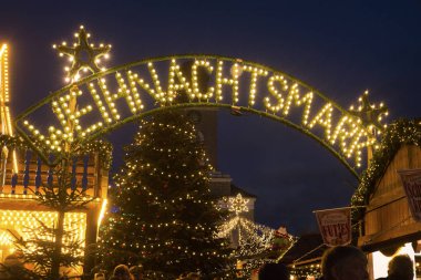 Sign at Christmas market in Husum, Schleswig-Holstein, Germany clipart