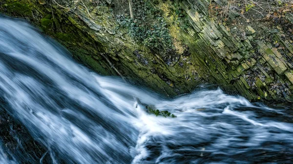 cool landscape, waterfall, green meadow in the background