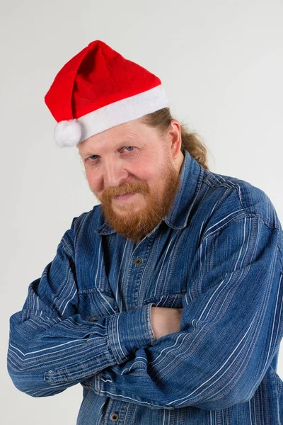 The man in Santa's hat. — Stock Photo, Image