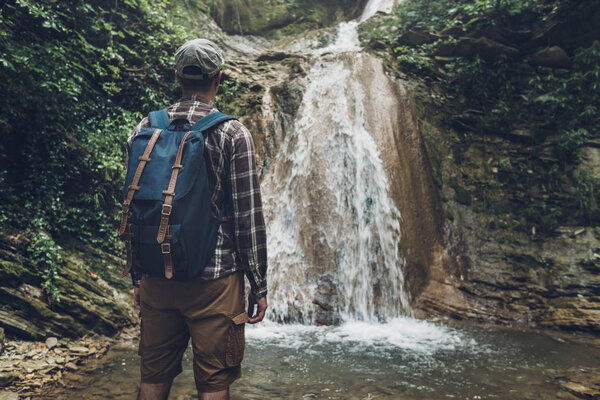 Unrecognizable Man Has Reached Destination And Enjoying View Of Wild Nature. Hiking Adventure Concept