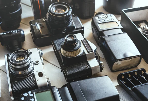 Vintage Film Camera, Digital Camera, Accessories And Lenses Technology Development Concept. Closeup