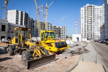 bulldozer working at the construction site clipart