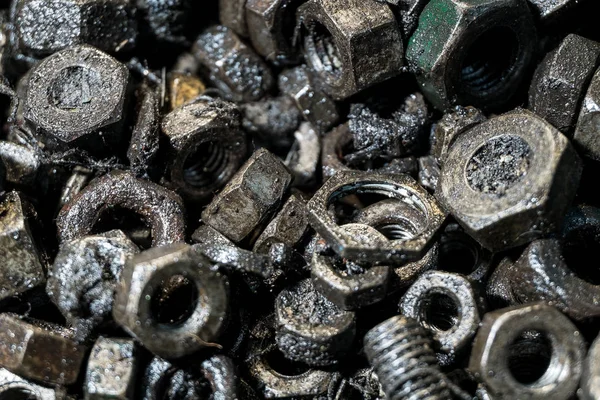 Detail van verschillende metalen bouten en moeren — Stockfoto