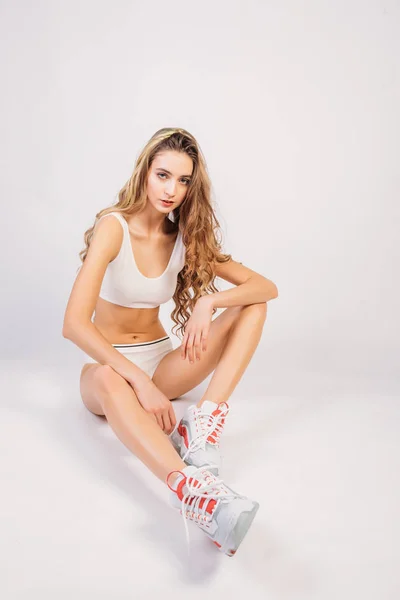 Young Girl Sports Underwear Resting White Background — 스톡 사진