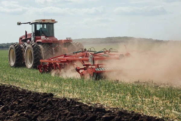 the process of cultivating the soil with the plow during plowing test drive