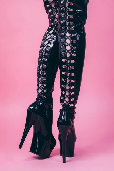 Long Black Sexy Bdsm High Heeled Leather Boots Pink Background — Stock Photo, Image