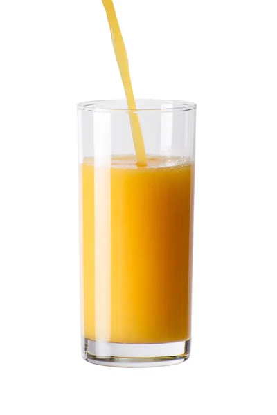 Verser du jus d'orange sur le verre — Photo