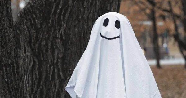 Little girl in a costume ghost — Stock Photo, Image