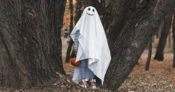 Little girl in a costume ghost — Stock Photo, Image