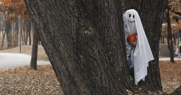 Little girl in a costume ghost — Stock Photo, Image