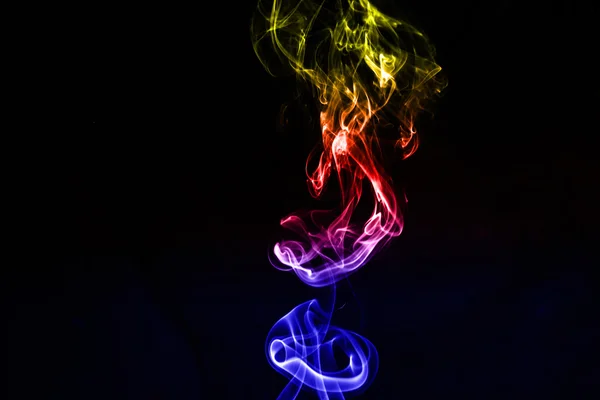 Abstract colorful smoke on the black background — Stock Photo, Image